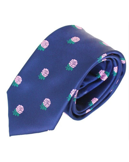 Corbata azul marino con flores rosas