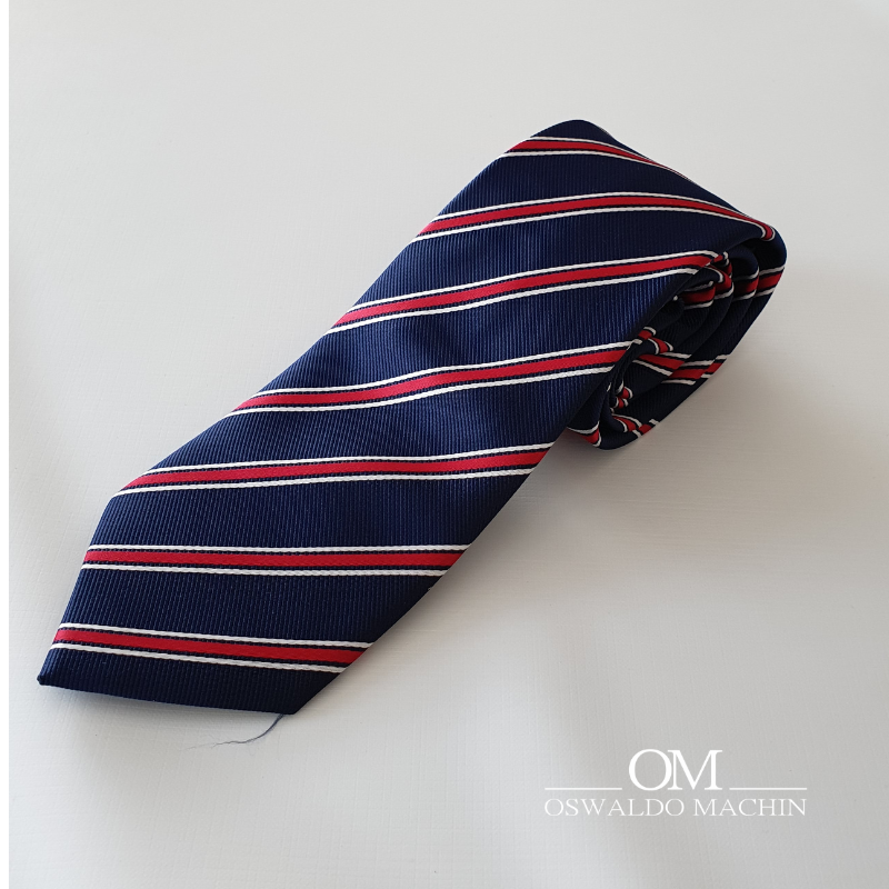Corbata azul marina con rayas rojas y blancas