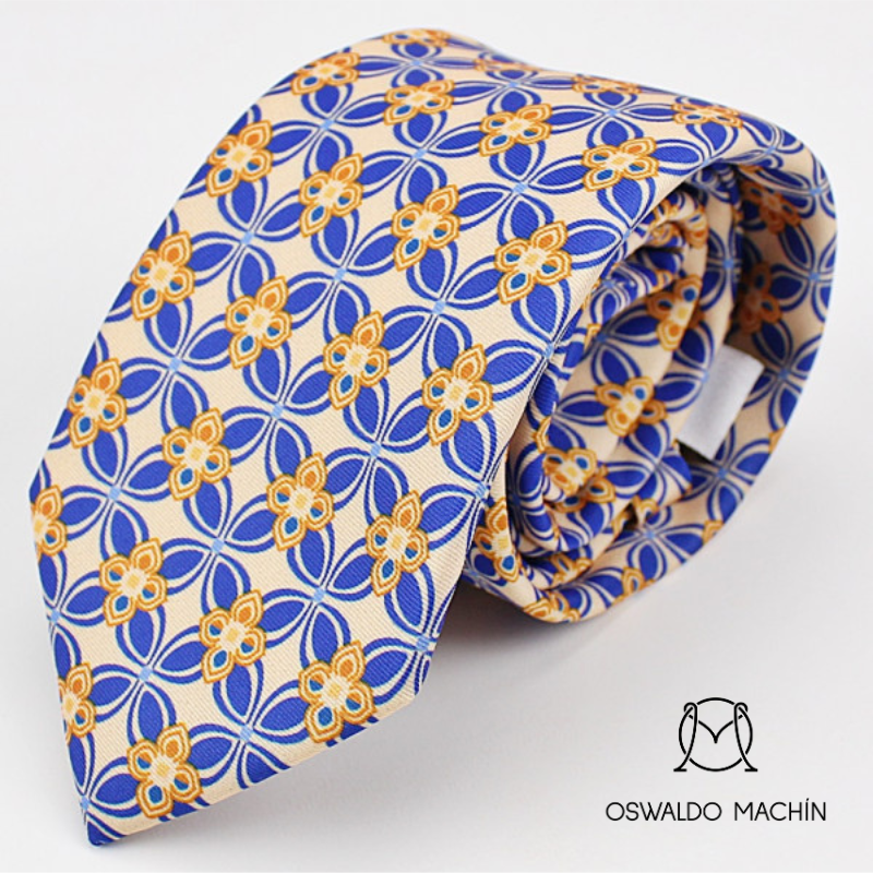 Corbata beige con estampado floral azul y dorado