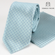 Pack corbata y pañuelo azul cielo con estampado floral