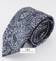 Corbata negra con estampado en cachemir plata